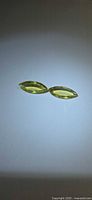 Pair of lemon citrine marquise gemstones front view