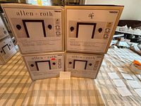 Four unopened Allen + Roth Ullie wall sconce boxes