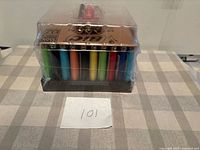 Front view of sealed Bic cube showing assorted colors and bonus lighters