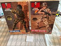 Front view of both boxed GI Joe figures showing titles and artwork