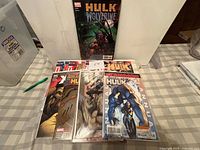 All comics spread showing covers, bagged and boarded