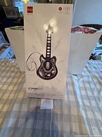 Front of sealed Best Choice Products kids electric guitar box