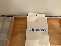 Brightroom bamboo tray with brand card showing lot number
