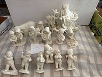 All figurines displayed on table