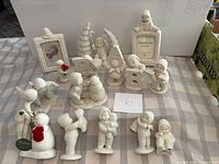 Overall view of all 12 Snowbabies items on table