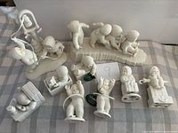 All seven Snowbabies figurines grouped