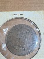 Obverse of 1922 5 Öre coin inside holder