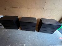 Front view of three matching 3-drawer chests