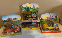 Group shot of all four packaged Autopia cars