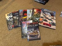 All eight Flames of War books fanned out showing covers
