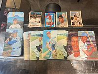 Overview of lot showing six standard cards and multiple oversize 1964 Topps Giants cards