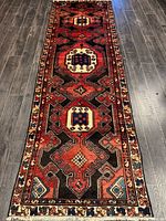 Full view of the rug showing entire field and borders