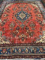 Full view of rug showing entire pattern and color palette