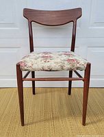 Front view of chair showing overall design, frame and upholstery