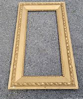 Full view front of rectangular gilt frame
