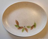 Front view of oval platter with leaf motif
