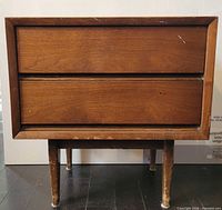 front view showing two drawers and legs