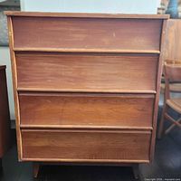 Front view of Pepplers high boy dresser showing four drawers and pulls