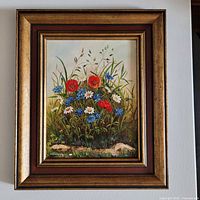 Front view of framed painting showing full artwork and frame