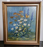 Full view of framed floral oil painting