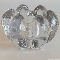 front angled view of crystal candle holder showing lobed form