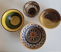 Overhead view of four ceramic pieces