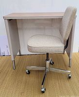 Desk front view with chair tucked under