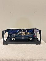 Front three-quarter view of BMW model in display packaging