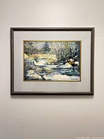 Front view of framed signed print