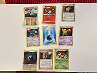 All nine cards laid out face-up on white surface