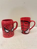 Two red Spider-Man mugs, full view of both styles
