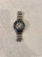 Front view of Elgin chronograph watch showing dial, bezel, bracelet