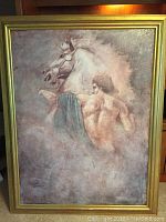 Full view of framed Parrish art print showing man and horse.