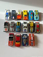 Full lot of 16 die-cast cars front angled view