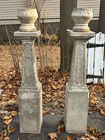 Front view of both plinths with pots attached