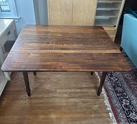 Top view of table with leaves raised showing surface and grain