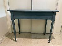 front view of blue painted pine hall table