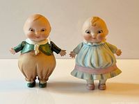 Both Happifat dolls front view