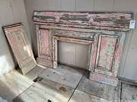 Front view of painted pine fireplace mantel with distressed paint