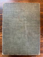 Front cover showing cloth texture and embossed birds