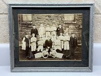 Framed sepia photograph of sports team