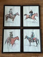 Group shot of the four framed Remington prints