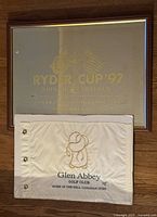 Both items: sealed Glen Abbey flag and framed Ryder Cup ’97 mirror