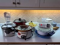 Full lot showing appliances, bowls, pressure cooker, knife sharpener, rolling pin