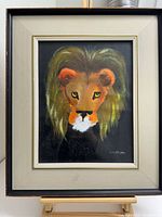 Full view of framed lion gouache painting