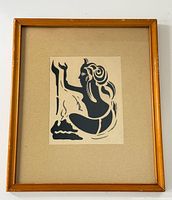 Full view of framed abstract woman print with beige mat and gold-tone wood frame