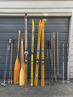 Full view of all items lined against garage door