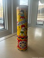 Full view of Acme Toys tin kaleidoscope standing upright