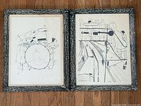 Both framed lithographs side by side