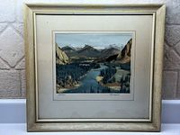 Full view of framed colourized photograph with mat and frame